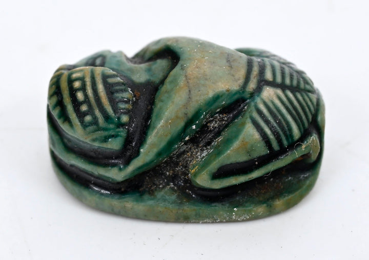 Egyptian Green-Glazed Steatite Scaraboid Surmounted by a Crouching Figure
