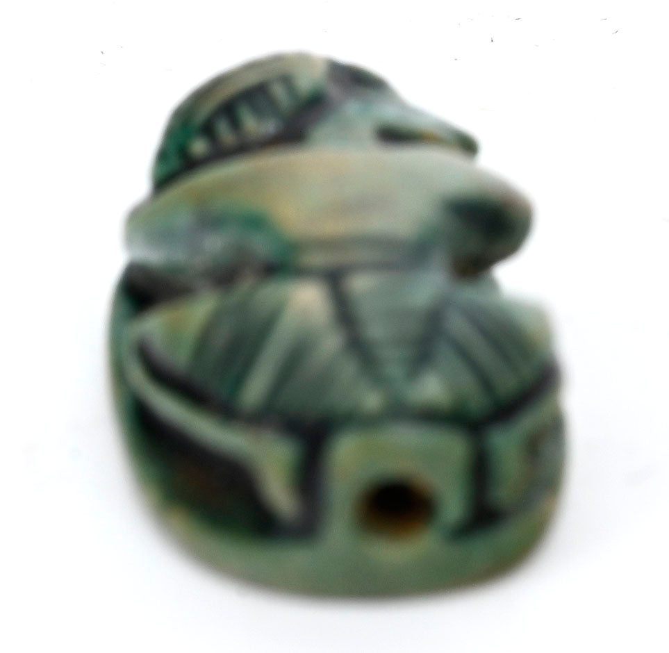 Egyptian Green-Glazed Steatite Scaraboid Surmounted by a Crouching Figure