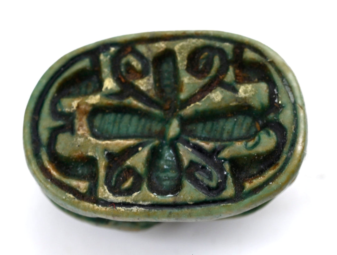 Egyptian Green-Glazed Steatite Scaraboid Surmounted by a Crouching Figure