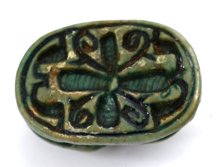 Egyptian Green-Glazed Steatite Scaraboid Surmounted by a Crouching Figure