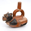 Chimú-Inca Polychrome Stirrup-Spout Vessel in the Form of a Recumbent Dog