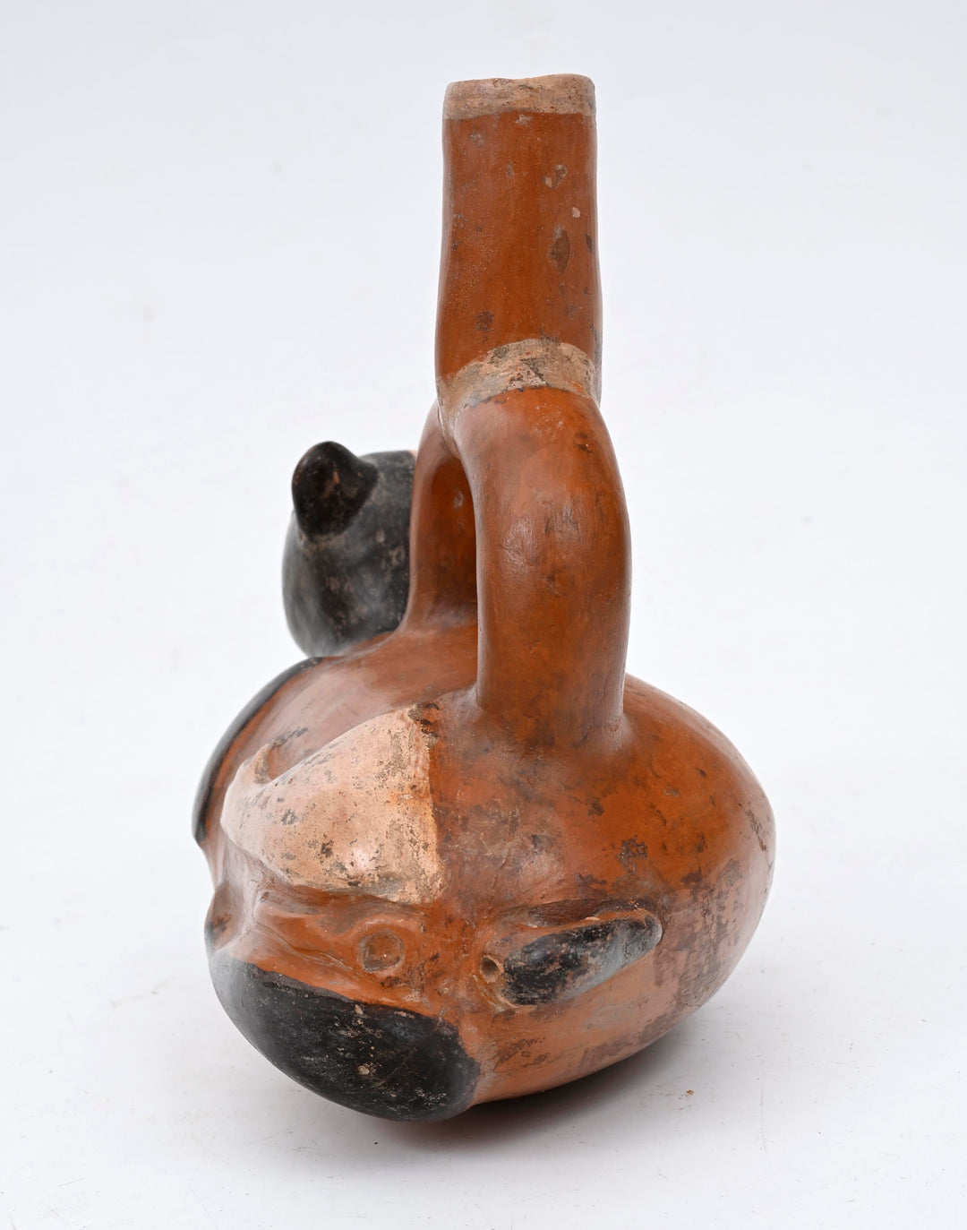Chimú-Inca Polychrome Stirrup-Spout Vessel in the Form of a Recumbent Dog
