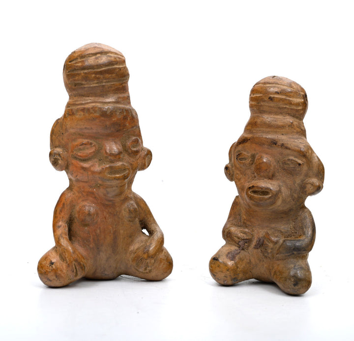 Pair of Cost Rician Pottery Seated Figures