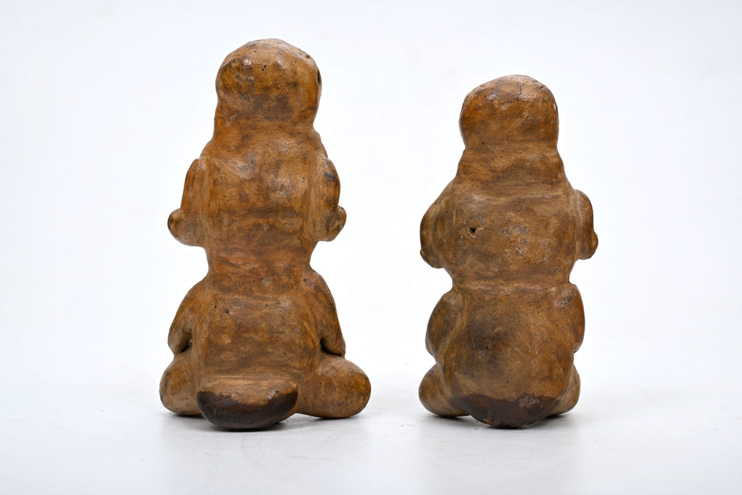 Pair of Cost Rician Pottery Seated Figures