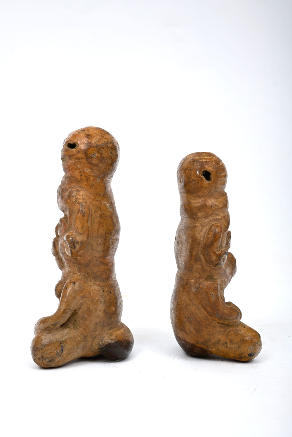 Pair of Cost Rician Pottery Seated Figures