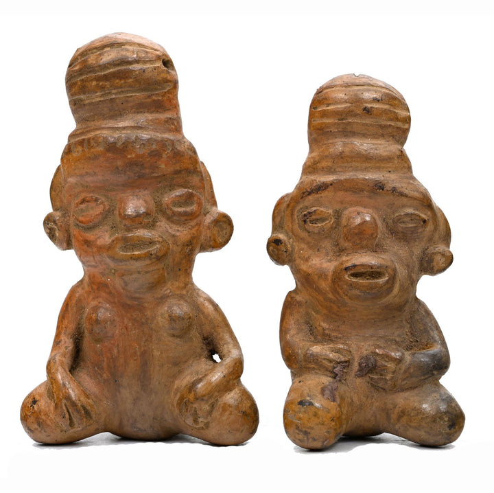 Pair of Cost Rician Pottery Seated Figures