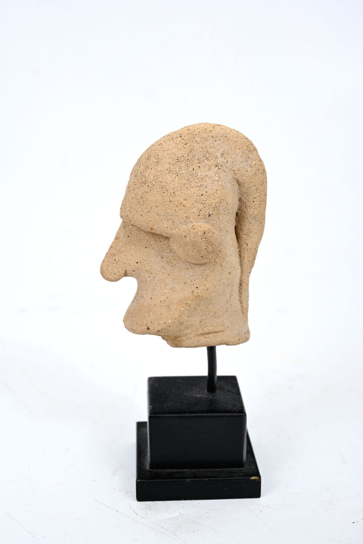 Cypriot Terracotta Head of a Man with a Pointed Cap