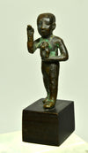 Egyptian Bronze Striding Priest holding a Baboon