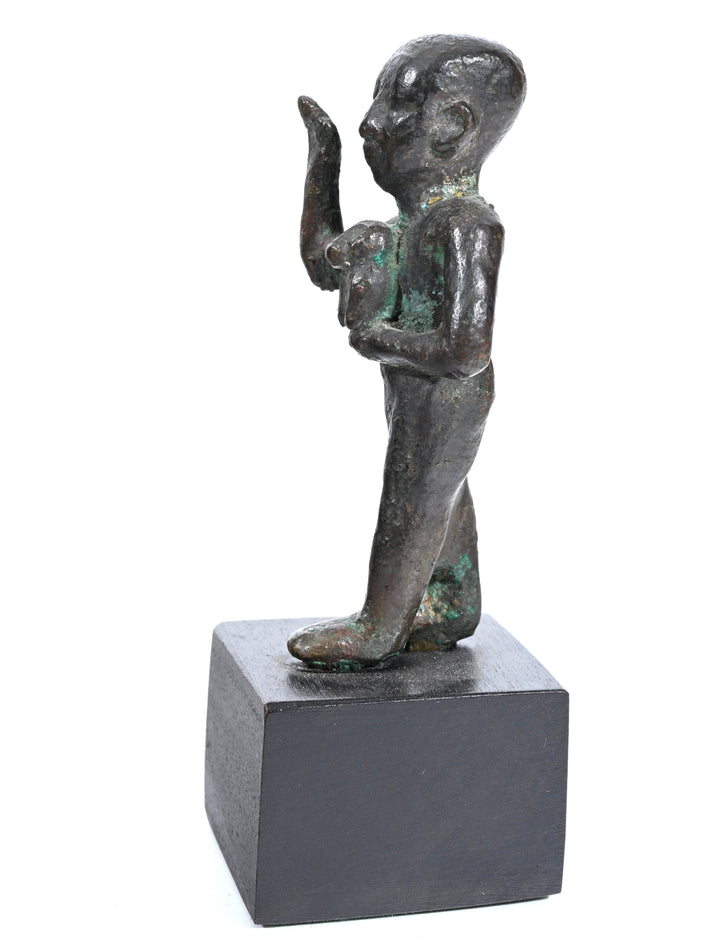 Egyptian Bronze Striding Priest of Thoth Holding a Baboon