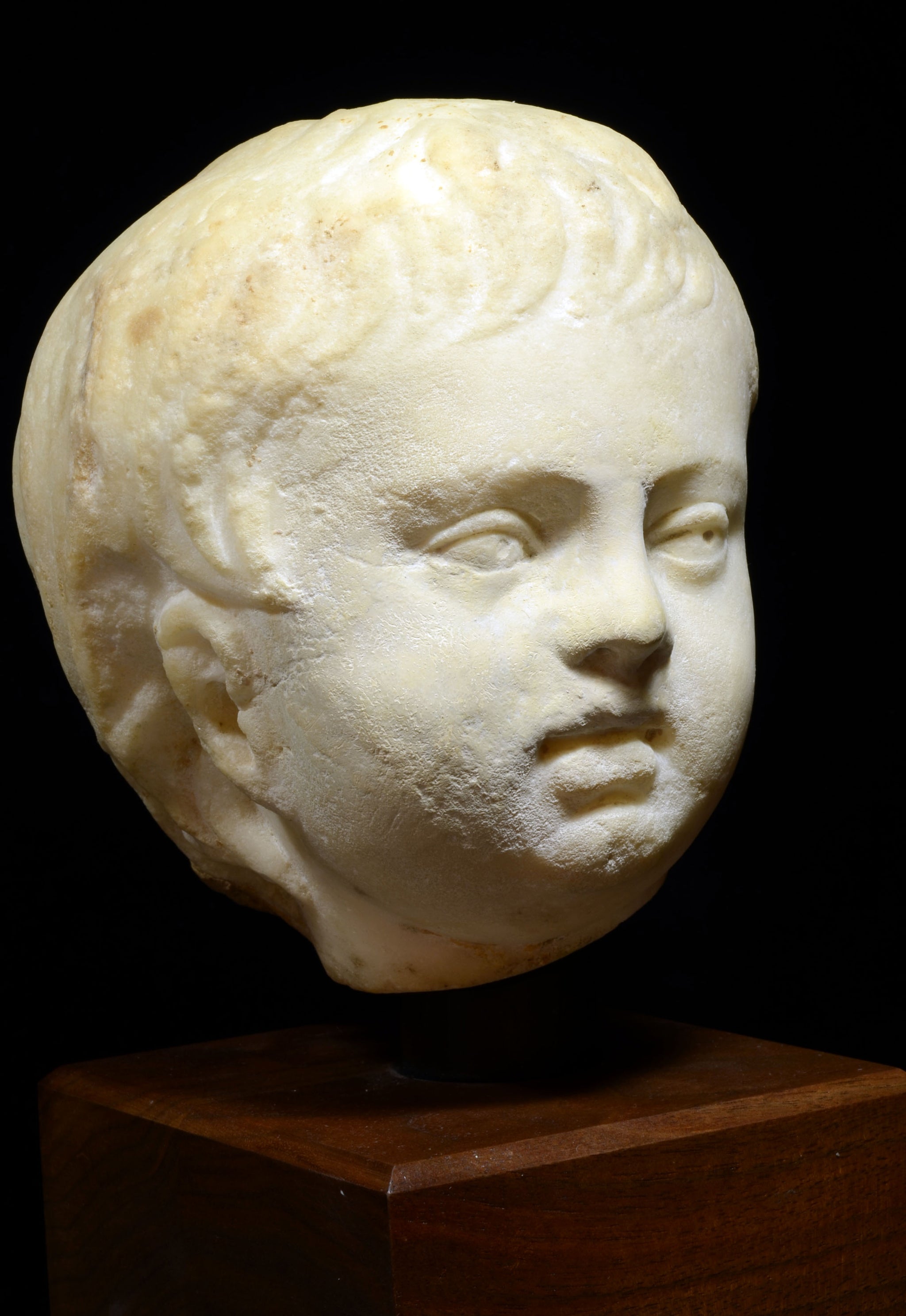 Naturalistic Roman Marble Head of Male Youth for sale at auction