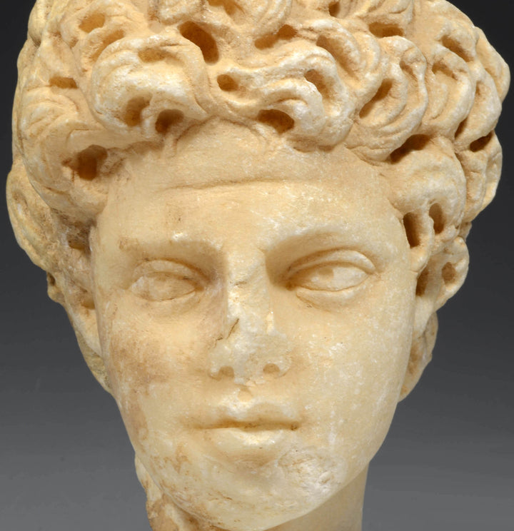 Roman Marble Head of a Youth with Tossed Hair