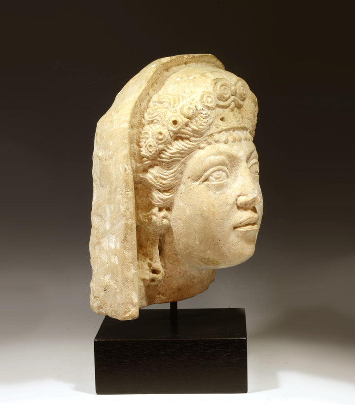 Roman Limestone Portrait Head of a Veiled Woman