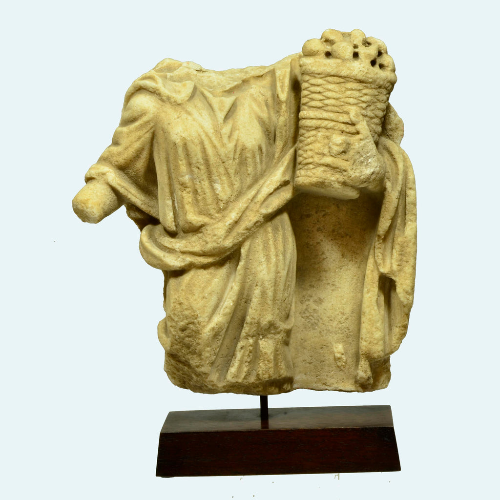 Roman Marble Relief Fragment of a Female holding a Casket
