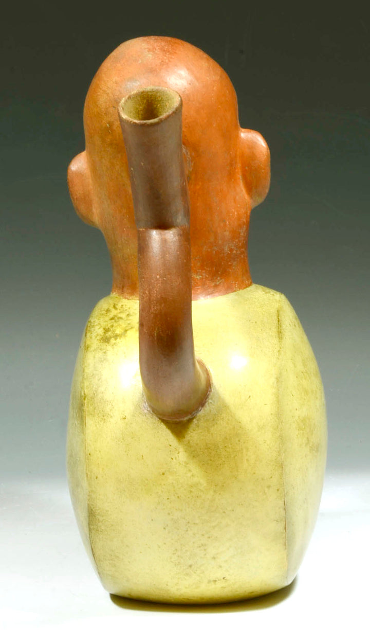 Expressive Peruvian Moche Figural Stirrup Vessel