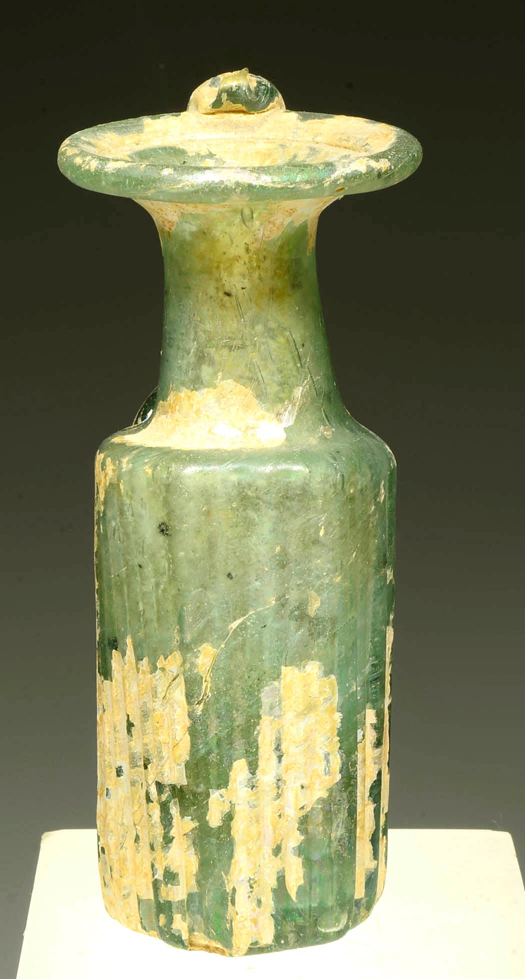 Roman Green Glass Ribbed Bottle