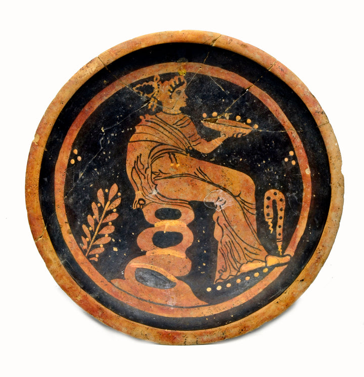 Apulian Red Figure Plate with a Seated Draped Female