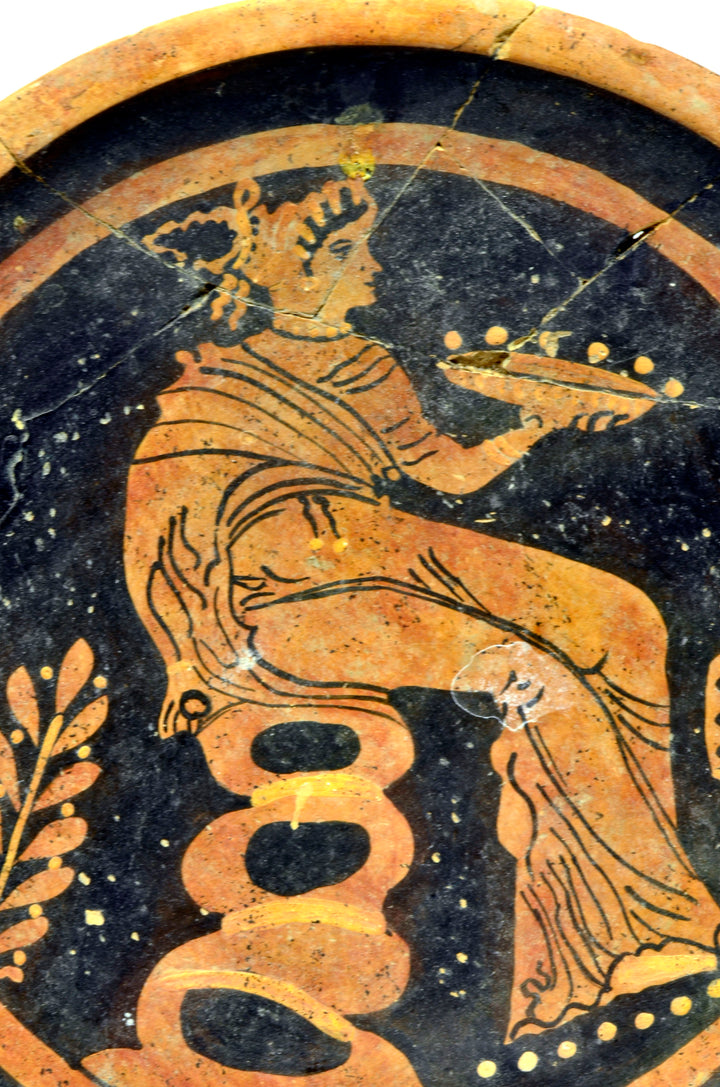 Apulian Red Figure Plate with a Seated Draped Female