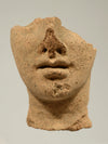 Etruscan Terracotta Fragment of a Votive Head