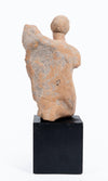 Greek terracotta statuette of a Kneeling Nude Female