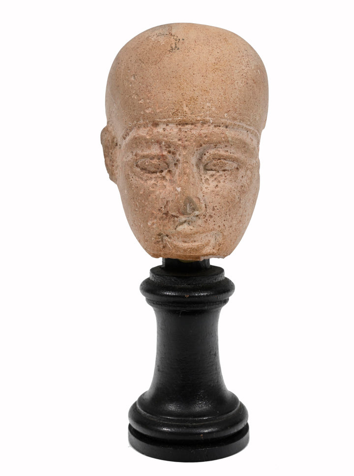 Egyptian Limestone Head of a Priest possibly Ptah