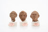 Group of three Hellenistic Alexandrian terracotta grotesque character heads
