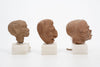 Group of three Hellenistic Alexandrian terracotta grotesque character heads