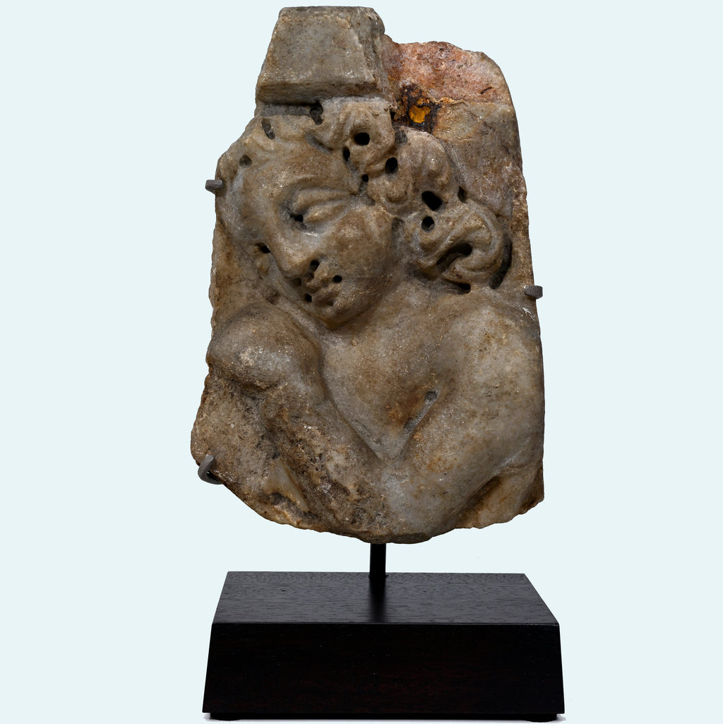 Roman Marble Relief Fragment with Head of a Youth