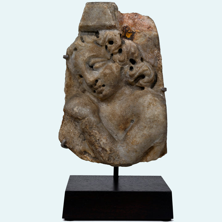 Roman Marble Relief Fragment with Head of a Youth