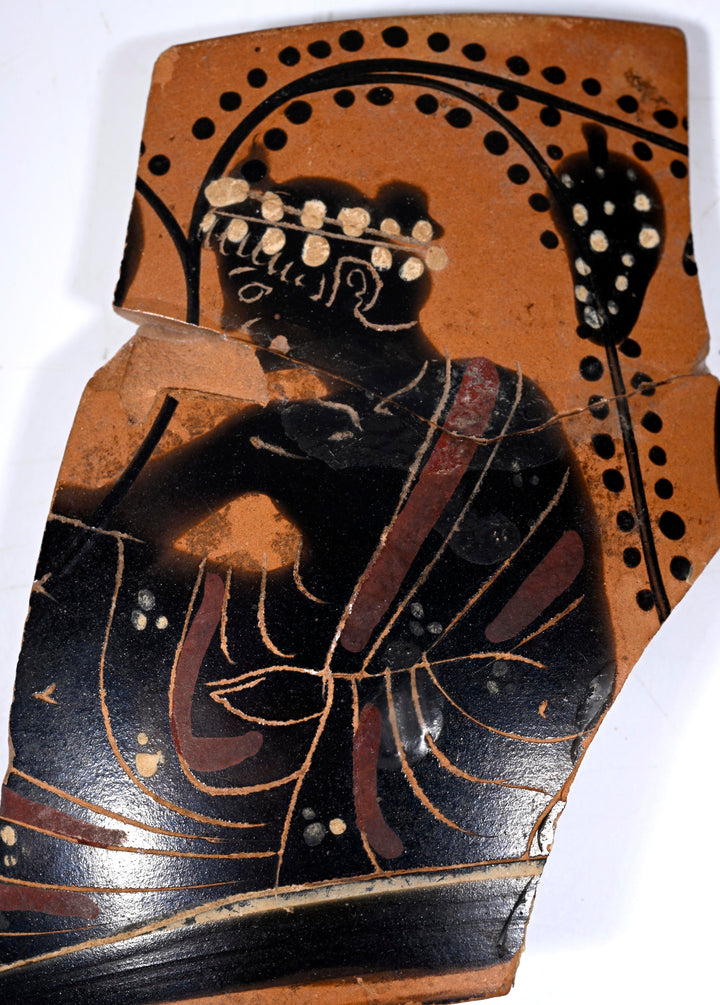 Attic Black-Figure Kyathos Fragment with Symposiast