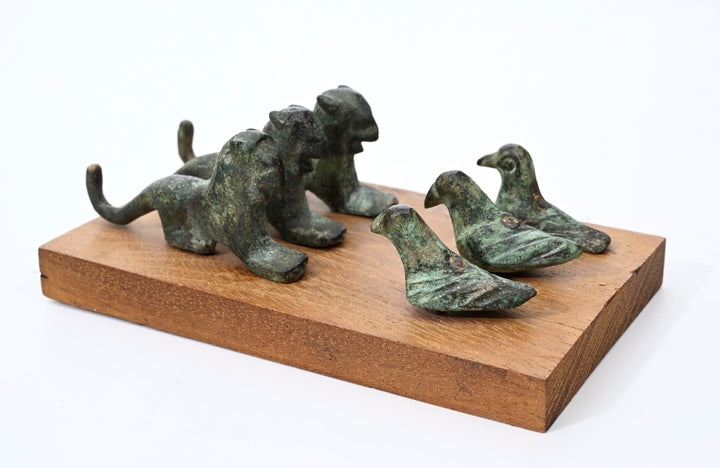 Italic Group of four Small Bronze Felines and Four Birds