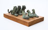 Italic Group of four Small Bronze Felines and Four Birds