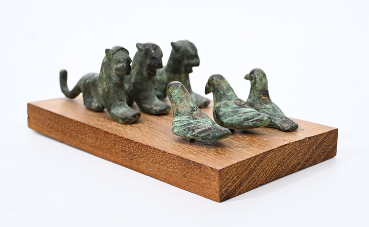Italic Group of four Small Bronze Felines and Four Birds