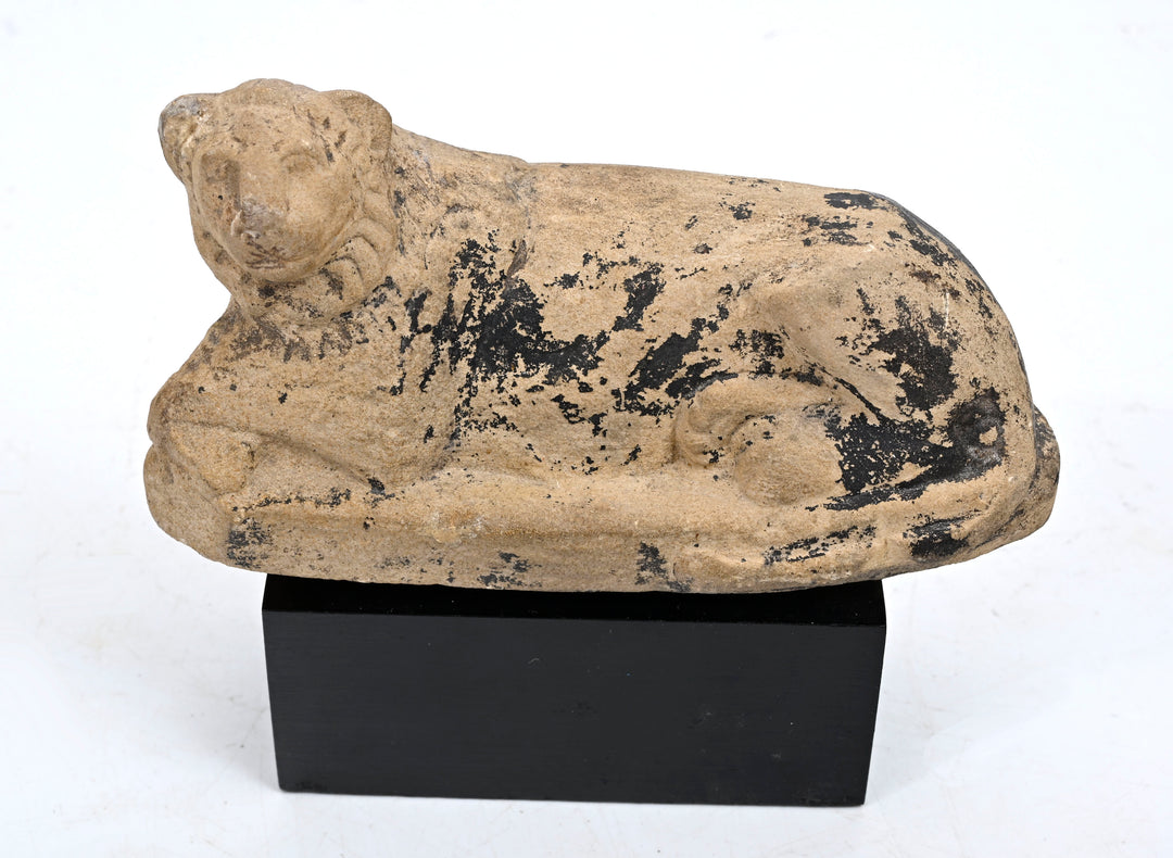 Egyptian Carved Limestone Recumbent Lion