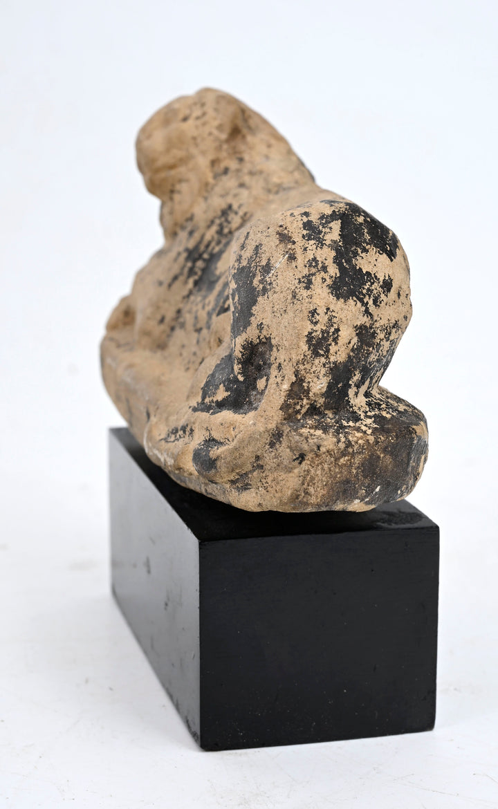 Egyptian Carved Limestone Recumbent Lion