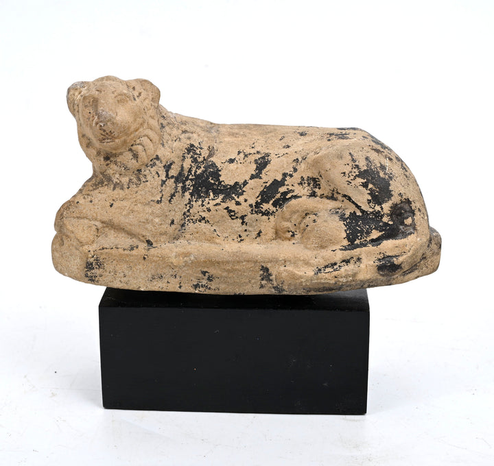 Egyptian Carved Limestone Recumbent Lion
