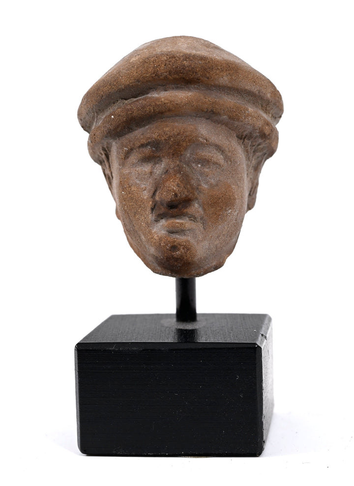 Hellenistic Terracotta Head of a Man in Cap