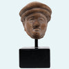 Hellenistic Terracotta Head of a Man in Cap