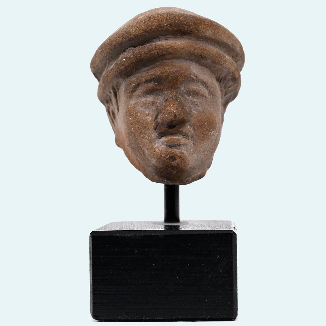 Hellenistic Terracotta Head of a Man in Cap