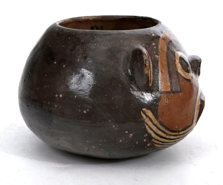 Nazca polychrome effigy bowl, top view showing bulbous form and rim