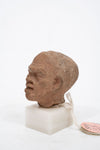 Group of three Hellenistic Alexandrian terracotta grotesque character heads