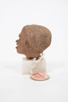 Group of three Hellenistic Alexandrian terracotta grotesque character heads